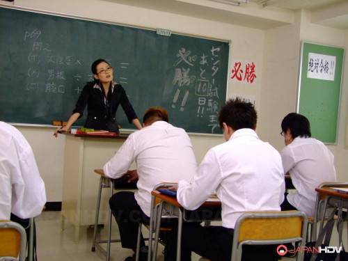 Kinky Teacher In Uniform Yui Komine Is Doing Blowjob Over Studentâ€™s Piston on pornstar6.com