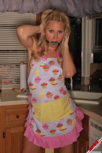 Gagged Bimbo Rachel Sexton Is Fooling Around In Dress And Half Nude In The Kitchen on pornstar6.com