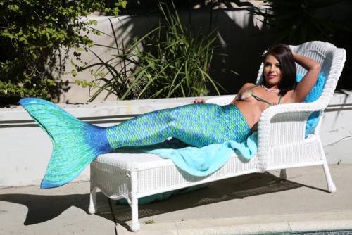 Sensual Brunette Adriana Chechik Takes Her Mermaid Fishtail Off And Shows Her Slit on pornstar6.com