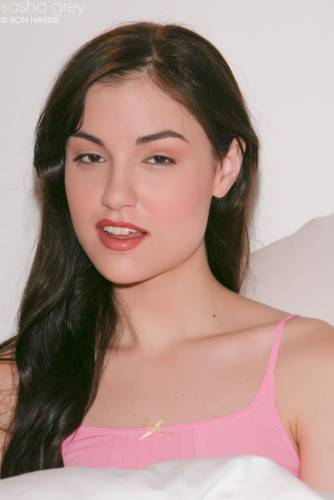 Lewd Brunette In Pink Lingerie Sasha Grey Naughtily Shows Tits And Flashes Pussy on pornstar6.com