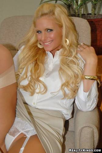 Busty Office Blonde Phoenix Marie Strips Down To Her White Garter Belt And Gets Boned on pornstar6.com