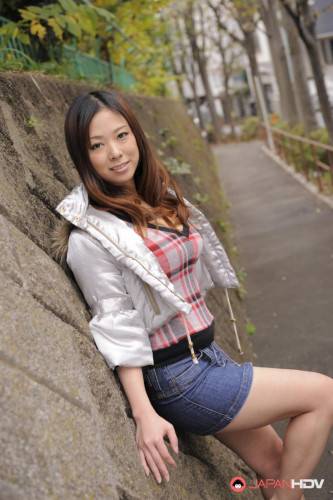 Asian Chick In A Short Jeans Skirt Asuka Is Sexily Posing In The Autumn City on pornstar6.com