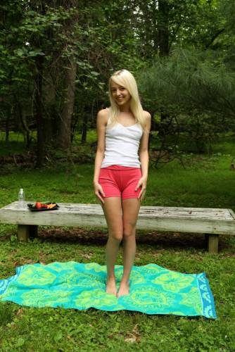 Blonde Teenager Sierra Nevadah Sets On The Green Lawn And Dildo Fucks The Beaver on pornstar6.com
