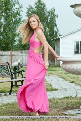 A Pink Dress Looks Great On Delicious Blonde Senta L As She Is Posing Outdoor. on pornstar6.com