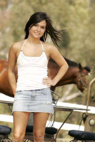 Sexy Brunette Doll Eden Petty In Jeans Skirt Makes A Strip Show By A Farm In The Country on pornstar6.com