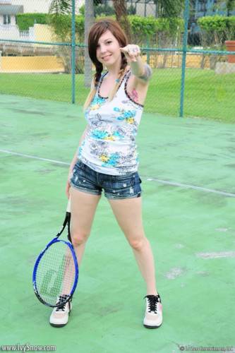 Heavy Chested Pale Brunette Ivy Jean Exposes Her Tattoos On The Tennis Court on pornstar6.com
