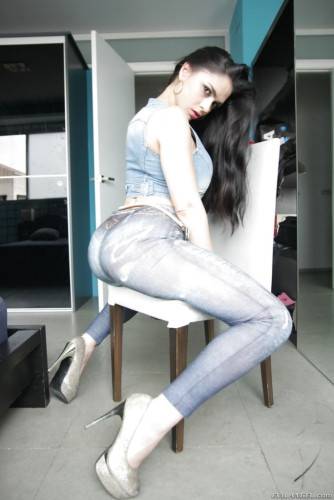 Charming latin brunette Marta La Croft in jeans revealing big tits and sexy ass on pornstar6.com