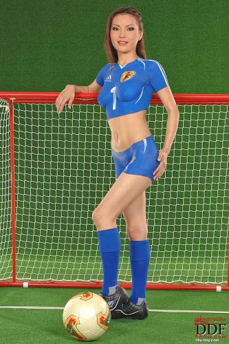 Oriental Body Art Model Annie Ling Pretends That She Wears Blue Skin Tight Soccer Uniform on pornstar6.com