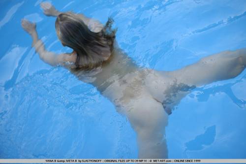 The Absolutely Naked Body Of Luscious Teen Doll Yana B Is Luxuriating In The Pool on pornstar6.com