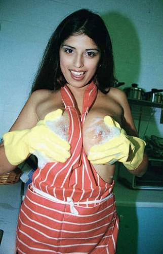 Naughty Housewife Kerry Marie In Yellow Gloves Demonstrates Her Huge Jugs And Twat on pornstar6.com