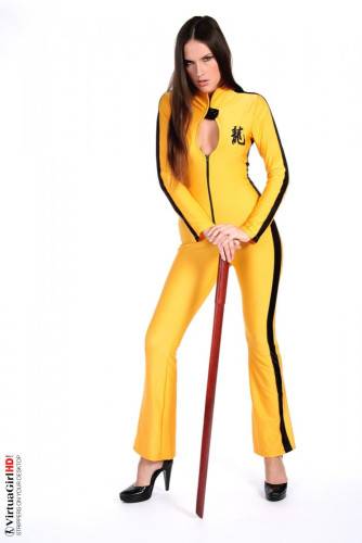 Deny Is Such A Hot Brunette, Dressed In A Kill-bill Style Yellow Suit Looking Sexy. on pornstar6.com