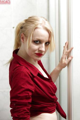 Stunning latvian blond cutie Bella Lei baring big titties and spreading her legs in the bathroom - Latvia on pornstar6.com