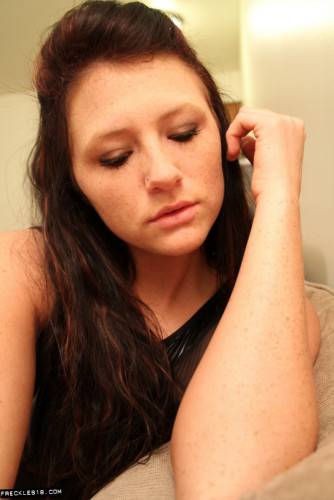 Dark Haired Hottie Freckles Teases In Black Lingerie And Strips For The Webcam on pornstar6.com
