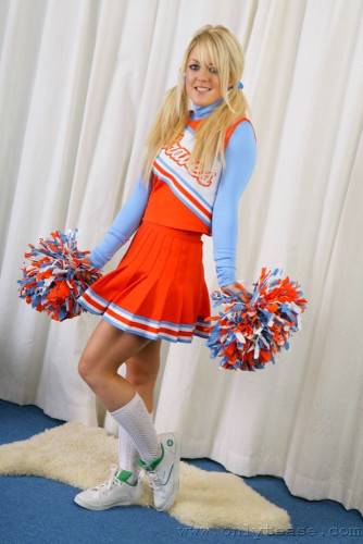 Sexy Cheer Girl Tanya P Poses In Her Cheerleader Uniform And Shows Her Panties on pornstar6.com