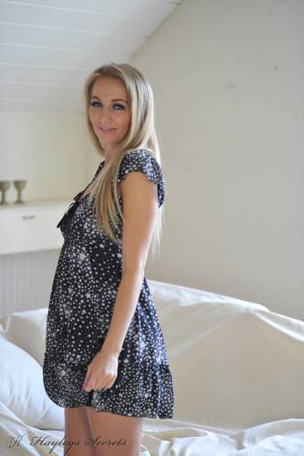 Beautiful Blonde Girl Hayley-Marie Coppin Is Posing In The Dress Slowly Baring Off Body on pornstar6.com