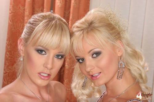Fine Blondes Natalli Di Rossa And Jenny M Stretch Each Others Asses And Pussies With Big Dildos on pornstar6.com