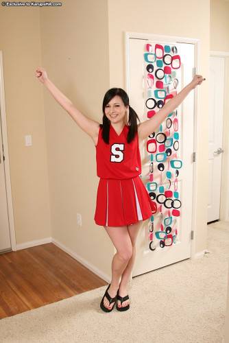 Skinny Flat Chested Kitty Ashli Orion Strips Out Of Her Red And White Uniform on pornstar6.com