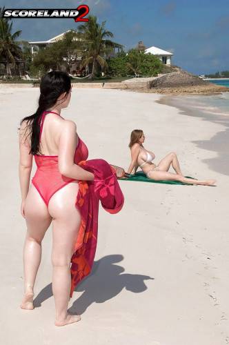 Lush girls Angela White and Christy Marks kissing andhaving fun with toy on the beach on pornstar6.com