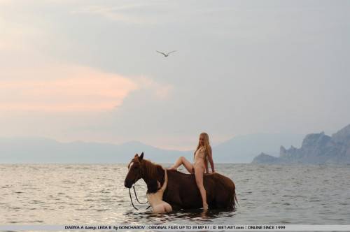 Naked Slender Lesbian Friends Dariya A And Lera B Ride The Horse Naked Together At The Seaside on pornstar6.com